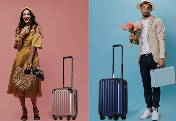 スーツケースと男女